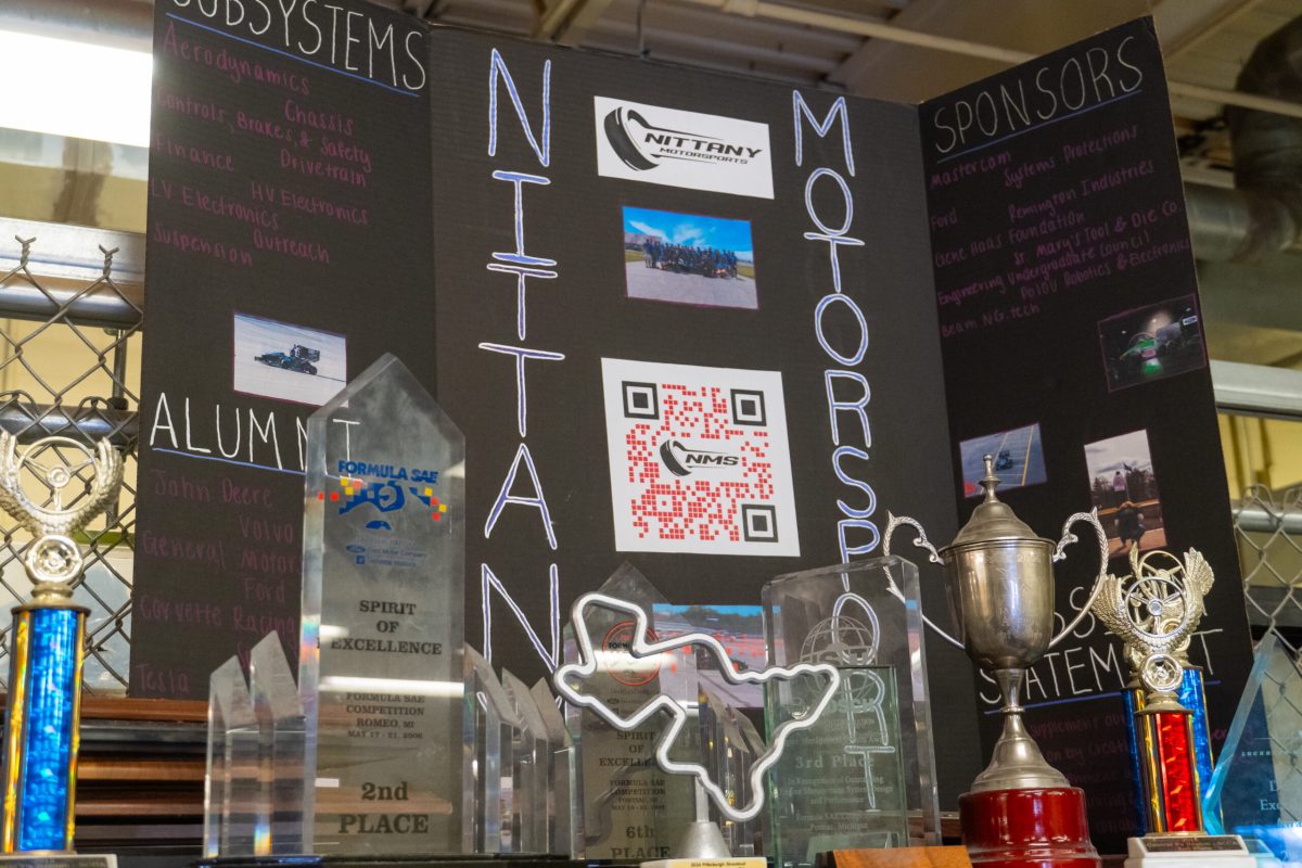 A display of accolades won by Nittany Motorsports spanning 20+ years, along with the club's engagement fair poster.